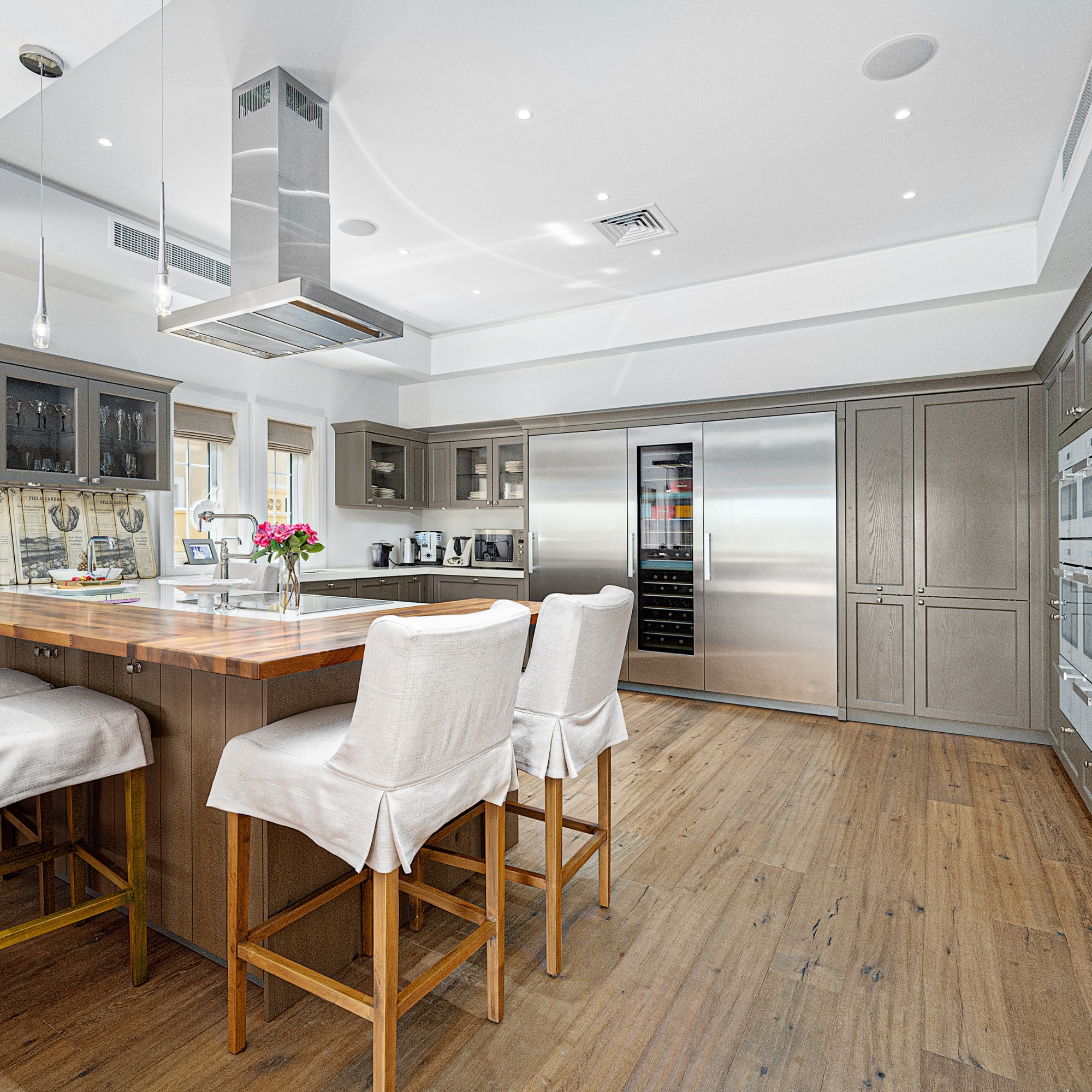Custom kitchen island with fluted wood design