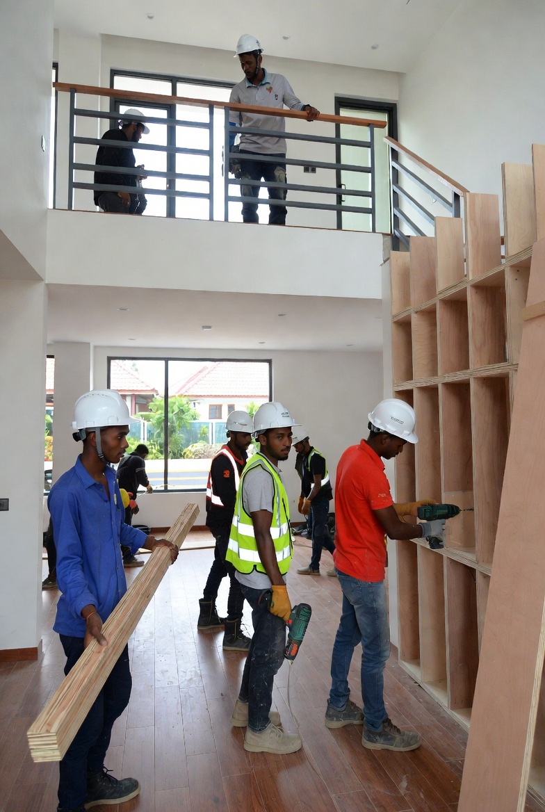 Custom shelving installation by joinery team